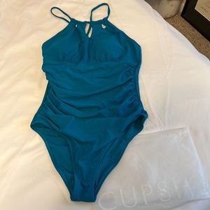 Emerald green 1 piece never worn size large